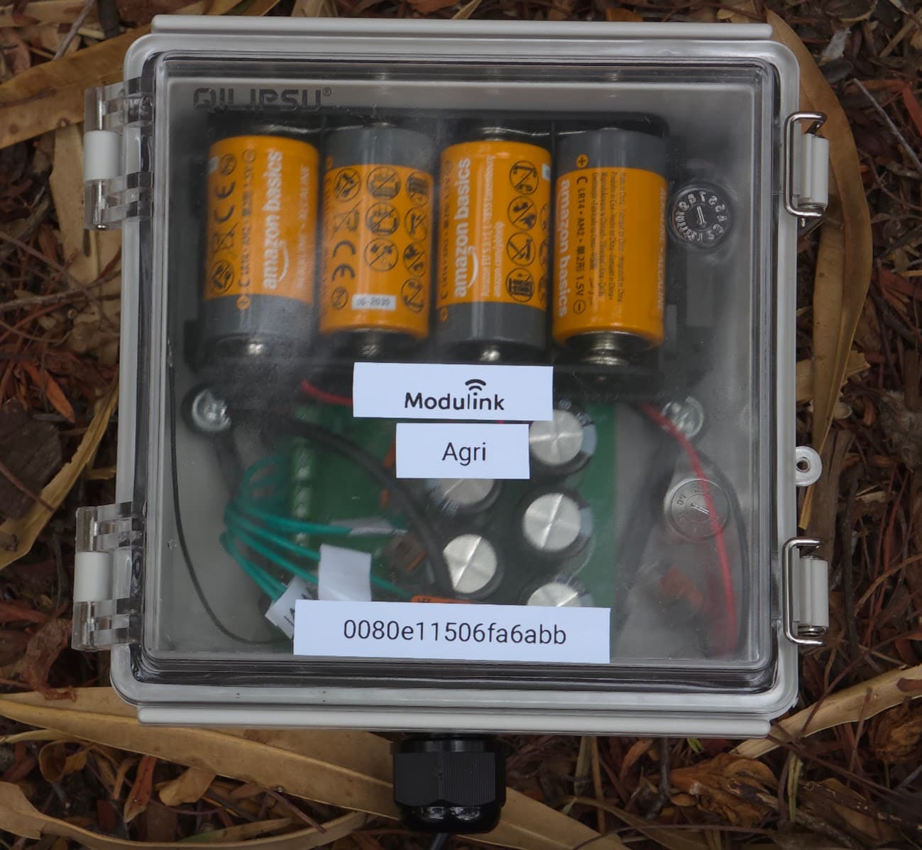Modulink Agri battery-powered field terminal in its clear enclosure