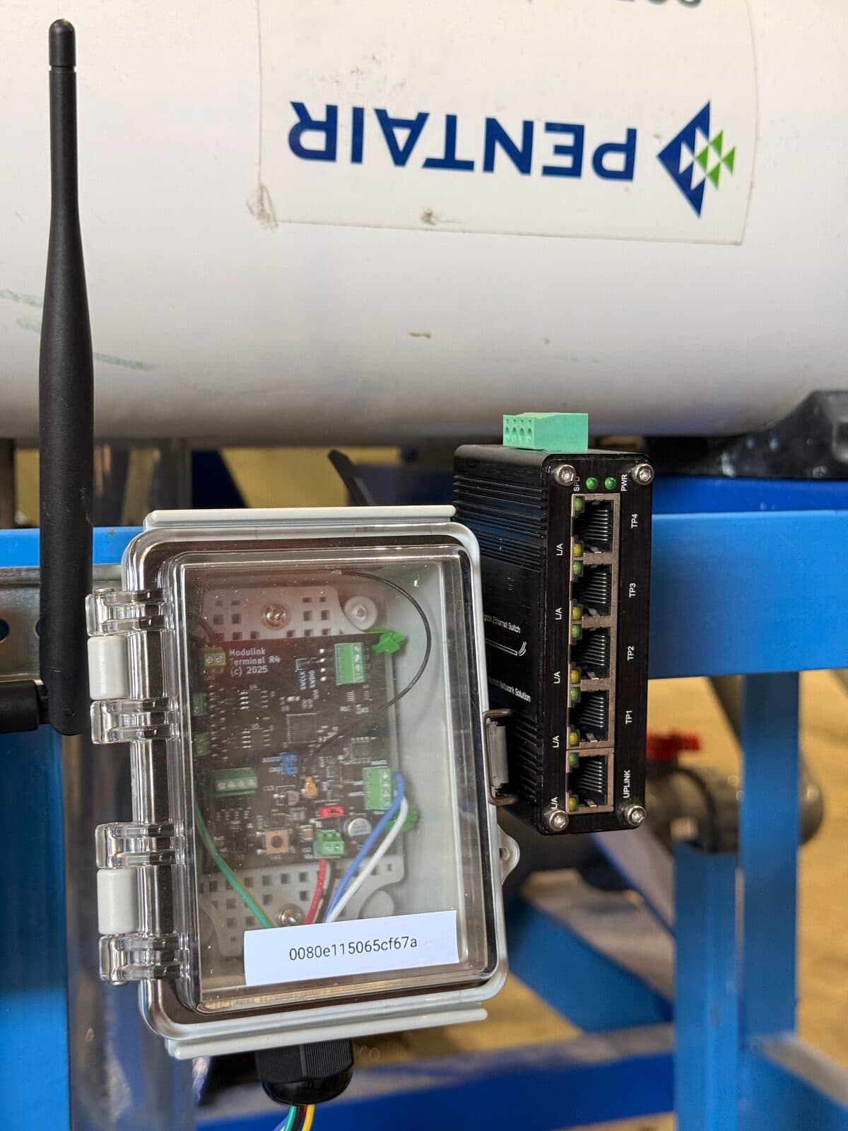 Modulink terminal installed beside a network switch on a Falcon Water Technologies RO cleaning skid